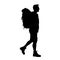silhouette of a backpaker tourist or traveler walking.