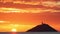 Silhouette of Ballycotton Lighthouse in county Cork, Ireland, at sunrise