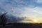 Silhouette of baseball diamond fence at dawn, beautiful sunrise