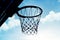 Silhouette basketball hoop outdoors in the cloud and blue sky