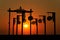 Silhouette of beach decorations at sunset