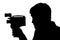 Silhouette bearded Man Movie Camera.