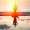 Silhouette of a beautiful yoga woman on the beach