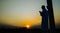 Silhouette of beautiful young man praying Islamic Arabic photo