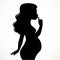 Silhouette of beautiful young pregnant woman put a finger to her lips and asked me not to reveal the secret