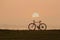 Silhouette bicycle with sunset or sunrise