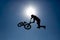 Silhouette biker blue sky