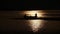 Silhouette of boat in backlit