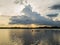 Silhouette of boat and fisherman.