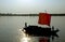 Silhouette of a boat on the Rupsa River near Mongla in Bangladesh