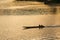 Silhouette of Boating Man boat ride in the river at sunset in Sa