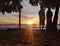 Silhouette of a boy and girl on the beach at sunset