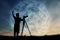 Silhouette of boy using camera