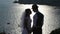 silhouette of a bride and groom