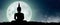 Silhouette of Buddha mediating with Full moon at night. Buddhist holiday Concept