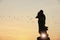 Silhouette of Buddha statue standing at Wat Phra That Khao Noi, Nan Province, Thailand