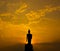 Silhouette Buddha statue in the sunset