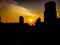 The silhouette of the building and tracks of BTS in the evening, Sunset view in Bangkok, Thailand