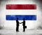 Silhouette of a Business Handshake with a Dutch Flag
