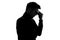 Silhouette of businessman considers his options, thinking about important project.