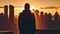 Silhouette of businessman looking over a cityscape at sunrise. AI Generated