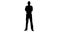 Silhouette of businessman standing with arms crossed