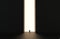 Silhouette of businessman standing in front of lighting door. 3d render.