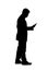 Silhouette of Businessman Using a Cell Phone
