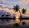 Silhouette of a caravan of camels and Bedouin