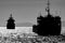 Silhouette cargo ships on Aegean Sea, IzmÄ±rSmyrna, Turkey. Black and white image