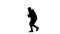 Silhouette Casual hip-hop man walking and talking on the phone and dancing.