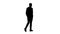 Silhouette Casual young man walking.