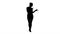 Silhouette Charming fitness girl walking and listening music.