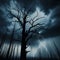 Silhouette of charred tree against storm and lightning