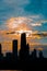 Silhouette of Chicago skyline viewed from the pier with orange a