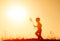 Silhouette of child girl with windmill