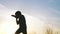 Silhouette child kid boxer. Boy a boxing with shadow exercising at sunset outdoor. Kid dream. Sport victory healthy