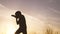 silhouette child kid boxer. boy a boxing with shadow exercising at sunset outdoor. kid dream. sport victory healthy