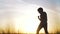 silhouette child kid boxer. boy a boxing with shadow exercising at sunset outdoor sun. kid dream. sport victory healthy