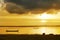 Silhouette of children on boat