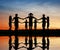 Silhouette children. sunset pond.