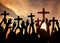 Silhouette of Christians holding crosses