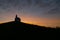 Silhouette of a church on a hill, de Terp, at sunrise, the Hague, Netherlands