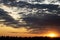 Silhouette of cityscaper buildings during a sunset