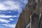 Silhouette of a climber on the wall of the Aiguille du Midi. Alp