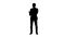 Silhouette Cool businessman using electronic