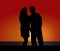 Silhouette Couple at Coastal Sunset