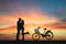 Silhouette of couple in love kissing in sunset. Couple in love c