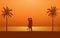 Silhouette couple man and woman kissing while cuddling on beach under sunset sky background