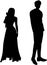 Silhouette of A Couple Man and Woman Standing Next to Each Other Wearing Party Clothes